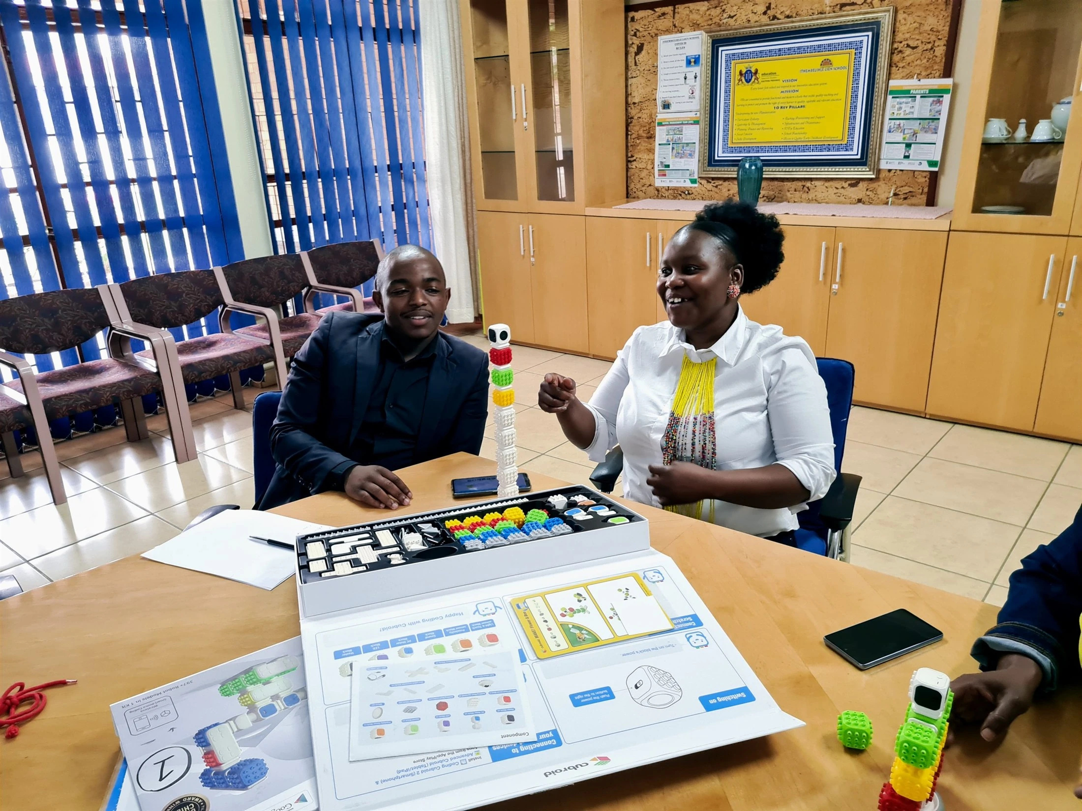 Educators exploring coding and robotics learning materials