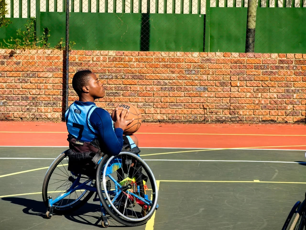 An original photograph retained from sports on the school website.