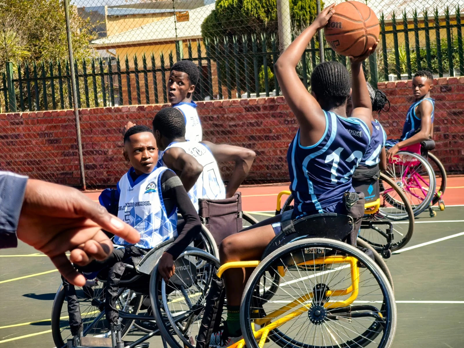 An original photograph retained from sports on the school website.